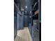 Walk-in closet with custom shelving and drawers for ample storage at 10130 Deercliff Dr, Tampa, FL 33647