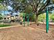 Community playground featuring swings, slides, and climbing structures for Gathering enjoyment at 10130 Deercliff Dr, Tampa, FL 33647