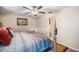 Comfortable bedroom featuring a ceiling fan and an ensuite bathroom at 10229 Bright Crystal Ave, Riverview, FL 33578