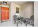 Inviting front porch with comfortable seating, perfect for enjoying quiet moments outdoors at 10229 Bright Crystal Ave, Riverview, FL 33578