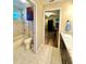 View of full bathroom featuring shower tub combo, and granite topped vanity at 11268 Shivering Owl Ave, Weeki Wachee, FL 34614