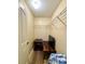 Walk-in closet with wood floors, wire shelving, and space for storage furniture at 11268 Shivering Owl Ave, Weeki Wachee, FL 34614