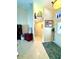 Welcoming entryway with neutral walls, tile flooring, and decorative accents at 11268 Shivering Owl Ave, Weeki Wachee, FL 34614