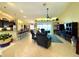 Spacious living room with tile flooring, and backyard access at 11268 Shivering Owl Ave, Weeki Wachee, FL 34614