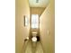 Clean and well-lit water closet at 11268 Shivering Owl Ave, Weeki Wachee, FL 34614