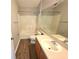 Bathroom with vanity, toilet and shower/tub combination with tile surround at 12604 Montford Ln, Riverview, FL 33579