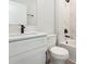 Modern bathroom features white cabinets, quartz counters, matte black finishes and tiled shower and tub at 13451 Kaplan Ter, Port Charlotte, FL 33981