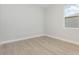 Bright empty bedroom with light gray flooring at 13451 Kaplan Ter, Port Charlotte, FL 33981