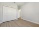 A bedroom with light gray flooring and a closet at 13451 Kaplan Ter, Port Charlotte, FL 33981