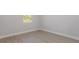 Bright bedroom with light gray flooring and a window at 13451 Kaplan Ter, Port Charlotte, FL 33981