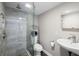 Modern bathroom with glass-enclosed shower and stylish vanity at 1422 Pinebrook Dr, Clearwater, FL 33755