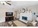 Bright and inviting living room with a decorative fireplace and stylish decor, perfect for relaxation at 1422 Pinebrook Dr, Clearwater, FL 33755