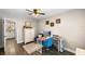 Office space with ceiling fan, computer desk, and easy access to the bathroom at 1422 Pinebrook Dr, Clearwater, FL 33755