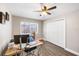 Office space featuring a desk, ceiling fan and closet at 1422 Pinebrook Dr, Clearwater, FL 33755