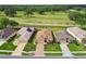 Desirable neighborhood with well-kept houses nestled on a golf course with mature trees and blue skies at 17425 Eagle Trace Dr, Brooksville, FL 34604