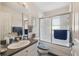 Clean bathroom with shower-tub combo, vanity, and blue accents at 17425 Eagle Trace Dr, Brooksville, FL 34604