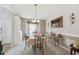 Cozy dining area with natural light, neutral colors, and seating for four at 17425 Eagle Trace Dr, Brooksville, FL 34604
