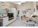 Bright living room with comfortable seating, built-in shelves, and doorway at 17425 Eagle Trace Dr, Brooksville, FL 34604