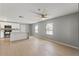 Open concept living room flows into the bright modern kitchen with island at 1843 38Th S St, St Petersburg, FL 33711