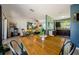 Open dining area with views to the living room and kitchen, creating a connected living space at 1942 Ashland Dr, Clearwater, FL 33763