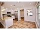 Bright kitchen featuring granite countertops, stainless appliances and updated cabinets at 2004 Chickwood Ct, Tampa, FL 33618