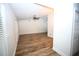 Spacious living room boasts wood-look flooring and vaulted ceiling at 2004 Chickwood Ct, Tampa, FL 33618
