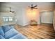 Open-concept living room features wood-look floors and vaulted ceilings at 2004 Chickwood Ct, Tampa, FL 33618