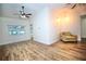 Inviting living room features wood-look floors and ample natural light at 2004 Chickwood Ct, Tampa, FL 33618