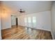 Spacious living room features wood-look floors and ample natural light at 2004 Chickwood Ct, Tampa, FL 33618