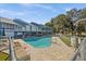 Relax by the community pool with lounge chairs and meticulously landscaped grounds, a true oasis at 2023 Golfview Dr # 2023, Tarpon Springs, FL 34689