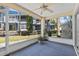 Enjoy peaceful outdoor living on this spacious lanai with a view of the manicured lawn at 2023 Golfview Dr # 2023, Tarpon Springs, FL 34689