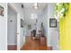Welcoming foyer with hardwood floors, high ceilings, and an open view into the living area at 206 147Th E St, Bradenton, FL 34212