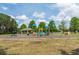 Community playground with colorful equipment and a covered picnic area at 206 147Th E St, Bradenton, FL 34212