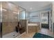 Main bathroom showcasing a large shower, soaking tub and stylish tile at 2109 N Jamaica St, Tampa, FL 33607