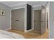 Bedroom features double closets with black hardware accents and a clean, modern aesthetic at 2109 N Jamaica St, Tampa, FL 33607