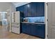 Elegant kitchen featuring custom cabinets and modern stainless steel appliances at 2109 N Jamaica St, Tampa, FL 33607