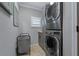 Modern laundry area with stacked washer/dryer, neutral paint, and plenty of room at 2109 N Jamaica St, Tampa, FL 33607