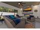 The covered outdoor space with fireplace and tv create a cozy and inviting living area at 2109 N Jamaica St, Tampa, FL 33607