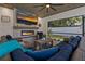 This outdoor space features a fireplace and a tv, as well as comfortable seating for a great entertainment space at 2109 N Jamaica St, Tampa, FL 33607