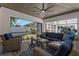 The large outdoor living space is an extension of the house with comfortable seating and an open view at 2109 N Jamaica St, Tampa, FL 33607
