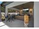 The outdoor patio is the perfect spot for entertaining, with a fireplace and tv at 2109 N Jamaica St, Tampa, FL 33607