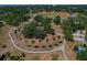 Aerial view of park grounds with walking paths, shade trees and palm trees at 2109 N Jamaica St, Tampa, FL 33607