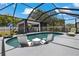 This beautiful pool has built in seating and a bar to enjoy while cooling off in the backyard at 2109 N Jamaica St, Tampa, FL 33607
