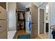 This walk in closet features built in shelves, drawers, and hanging space for optimal organization at 2109 N Jamaica St, Tampa, FL 33607
