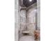 Stylish shower featuring modern shower head, bench seating and elegant tile design at 2111 Alexis Ct, Tarpon Springs, FL 34689