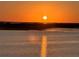 Amazing sunset over the water, perfect for relaxing and enjoying nature's beauty at 2111 Alexis Ct, Tarpon Springs, FL 34689