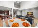 Spacious living area featuring kitchen island, comfortable seating, and open floor plan at 2671 Lakebreeze S Ln, Clearwater, FL 33759