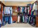 Spacious walk-in closet with ample storage and custom shelving at 2671 Lakebreeze S Ln, Clearwater, FL 33759