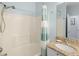 Well-lit bathroom featuring a shower-tub combination and a granite countertop vanity at 2741 Via Cipriani # 931A, Clearwater, FL 33764