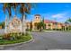 Grand Bellagio building with lush landscaping and inviting signage at 2741 Via Cipriani # 931A, Clearwater, FL 33764